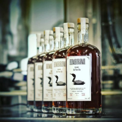 Himbrimi gin bottles lined up in a craft distillery