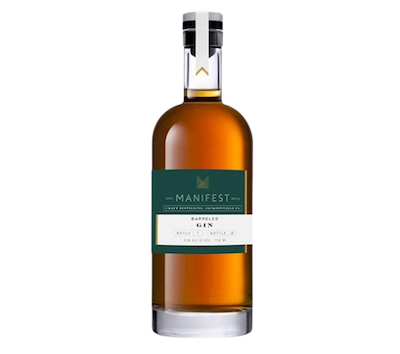 Manifest Barreled Gin bottle with dark amber color and green label on transparent background