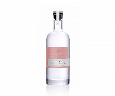 Manifest Florida Botanical Gin with pink label and elegant clear bottle on white background