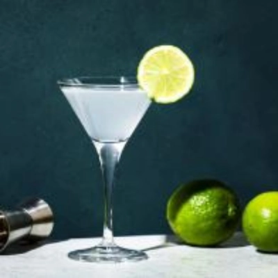 Gimlet classic gin cocktail with fresh lime juice served in a cocktail glass