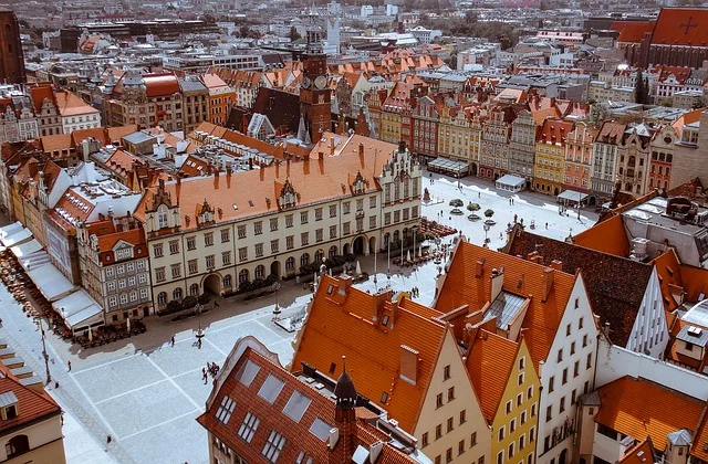 Aerial view of colorful historic buildings and market square in Poland