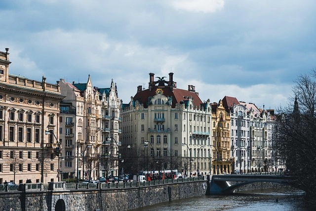 Colorful historic buildings along the river in Prague