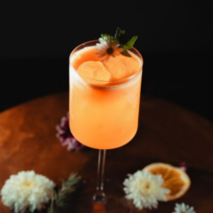 Sur Tropical Royal gin cocktail with Aperol, citrus and sparkling wine, summer cocktail served ice-cold